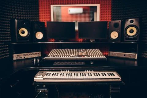 Equalizer of mixing console, computers, loundspeakers Stock Photos