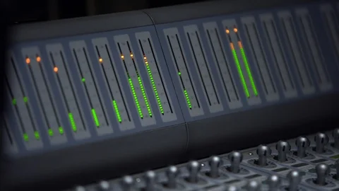 Equalizer at the recording console, on the scale of the light strips of green  Stock Footage 107194160
