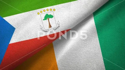Equatorial Guinea and Cote d'Ivoire Ivory coast two flags textile fabric texture Stock Photos