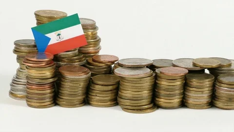 Equatorial Guinea flag waving with stack of money coins Stock Footage 71884968