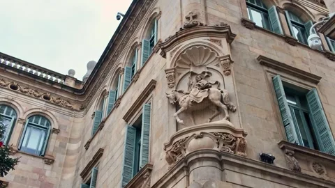Equestrian corner sculpture adorns the historic Palau de la Generalitat in Stock Footage 340600511