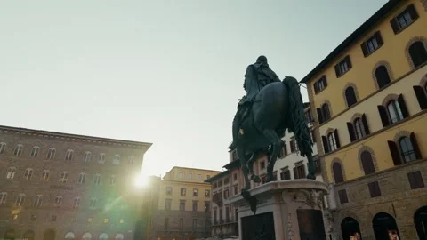 Equestrian monument to Cosimo I in the low sun, Florence, ground level drift Stock Footage 345737030