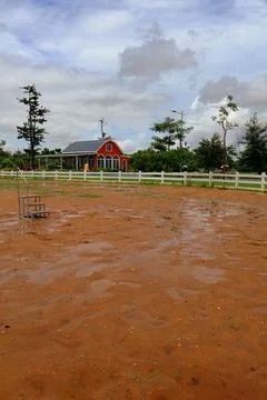 Equestrian Paddock and Red Barn at Koh Khsach Meas, Cambodia Stock Photos