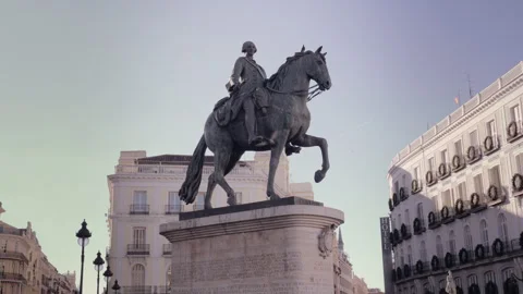 Equestrian statue of Carlos III at Puerta del Sol square in Madrid Stock Footage 308926533