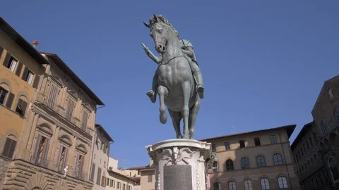 Equestrian statue of Cosimo I and Palazzo Vecchio, Florence, Tuscany, Italy Stock Footage 129251443