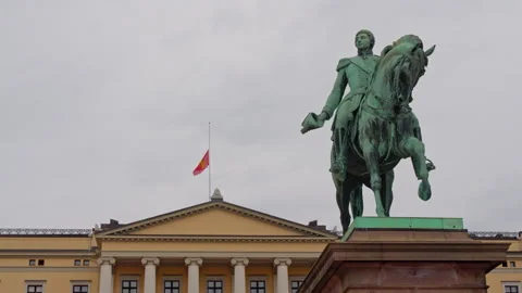 Equestrian Statue of King Karl Johan and Half Mast Flag at Oslo Royal Palace Stock Footage 343951059