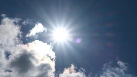 Equinox. Sunbeam, bright cloudy blue sky. Midday breeze, calming meditating.. Stock Footage 336731815