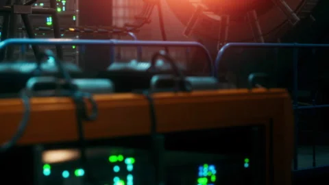 Equipment and control panels in a workshop setting during late hours Stock Footage 344965702