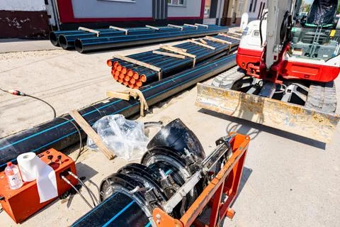 Equipment and device for butt welding polymeric HDPE water pipes Stock Photos