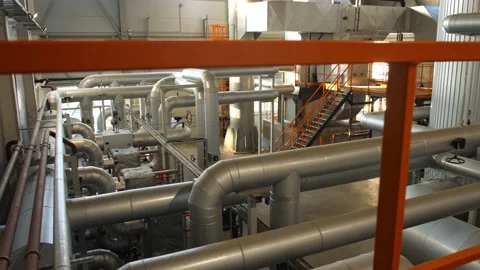 Equipment and piping as found inside of industrial thermal power plant Stock Footage 172093801
