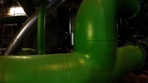 Equipment, cables and piping as found inside of a modern industrial power plant Stock Footage 73552939