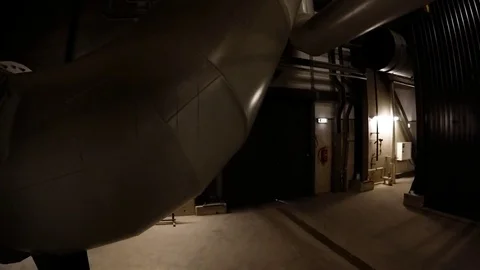 Equipment, cables and piping as found inside of a modern industrial power plant Stock Footage 73552940
