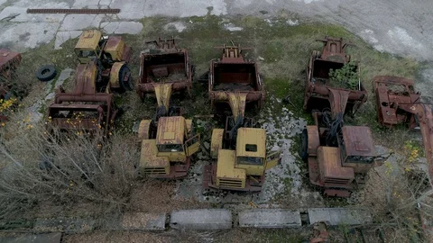 Equipment cemetery in the Chernobyl exclusion zone. City of Pripyat 動画素材 128317689