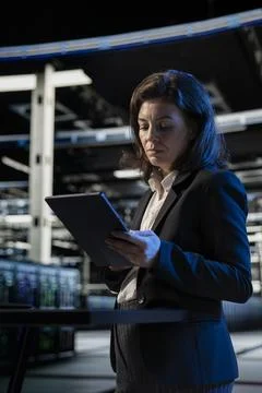 Equipment configuration install, tablet and programmer in data center Stock Photos