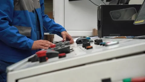 Equipment control panel in factory. Close-up of hands of worker, engineer, on Stock Footage 280189255