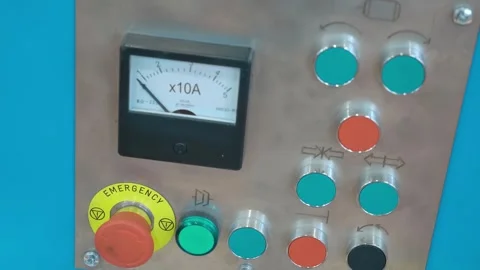 Equipment control panel with many buttons, ammeter and emergency stop button Video stock 333344723