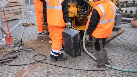 Equipment for drilling at great depth which is set in motion by a team of wor Stock Footage 95754685