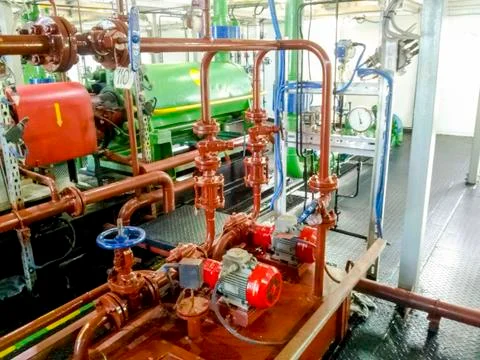Equipment inside the pumping station for pumping fluid. The oil industry. Pum Foto stock