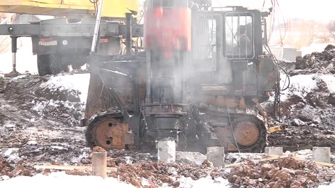 Equipment for installing piles in ground Stock Footage 160357705