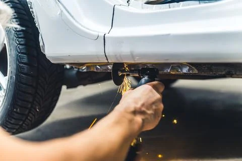 Equipment needed in mechanical work. Car repair process. Low angle indoor shot Stock Photos