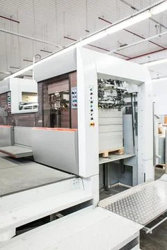 The equipment for a press. Offset machine at the printing manufacturing. Pr.. Stock Photos