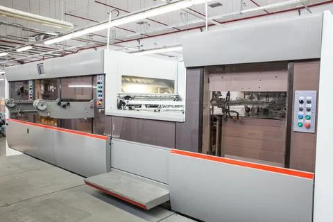 The equipment for a press. Offset machine at the printing manufacturing. Pr.. Stock Photos