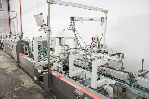 The equipment for a press. Offset machine at the printing manufacturing. Pr.. Stock Photos