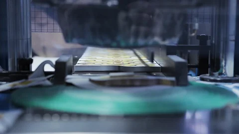 Equipment for printing process. Printing house. Printed sheets of paper. Indoors Stock Footage 98561007