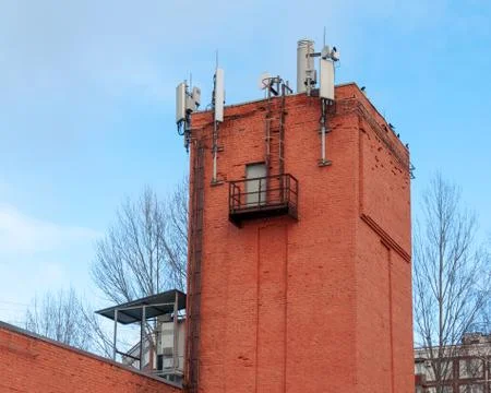 Equipment on the tower for cellular communication Stock Photos