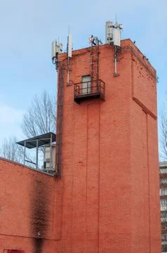 Equipment on the tower for cellular communication Stock Photos