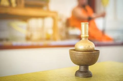 The equipment used in the rituals of Buddhism by the priests yellow dress, or Stock Photos