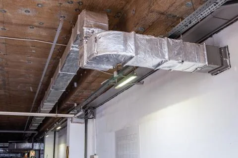 Equipment for ventilation and ceiling insulation systems in the Parking lot i Stock Photos