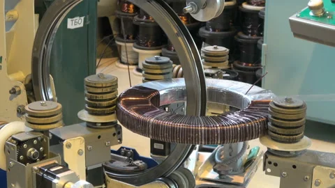 The equipment for winding of the toroidal coils Stock Footage 98493442