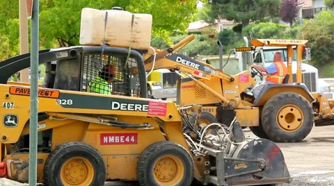 EQUIPMENT WORKING ON ROADWA Stock Footage 904871