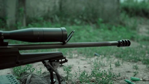 Equipped soldier prepares for fire. Sniper rifle. War. Military operation. Stock Footage 107480641