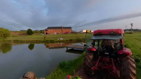 Equirectangular edited 360 vr clip of tractor pulling a flatbed loaded Video stock 94300476