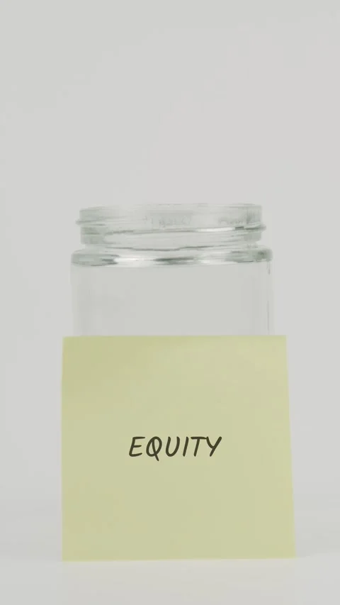 Equity text or word on yellow sticky note attached to glass jar with hand Stock Footage 311726656