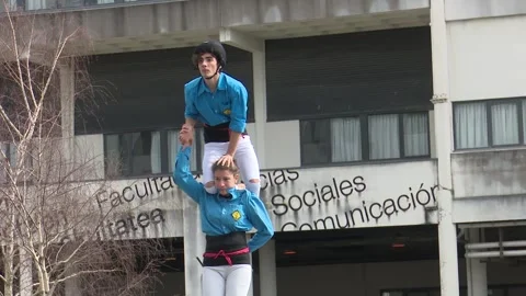 ERANDIO, SPAIN – 2022, APRIL 4: Castellers building human towers Stock Footage 327910153