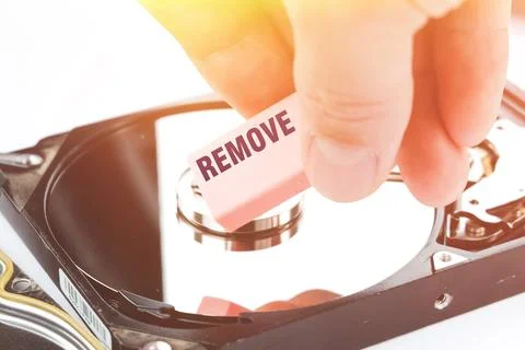 Eraser and computer hard drive. Deleting HDD data. Recovering user information. 스톡 사진