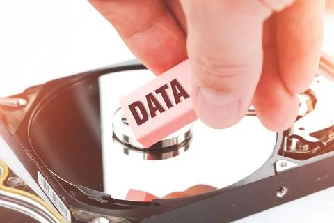 Eraser and computer hard drive. Deleting HDD data. Recovering user information. Stockfoto's