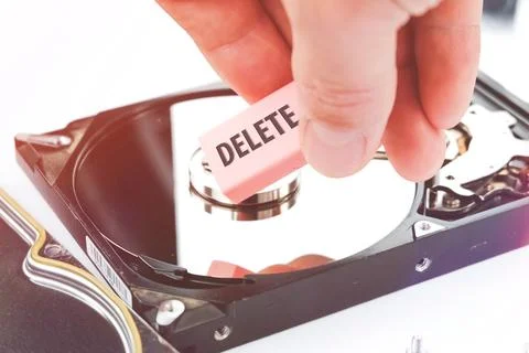 Eraser and computer hard drive. Deleting HDD data. Recovering user information. Stockfoto's