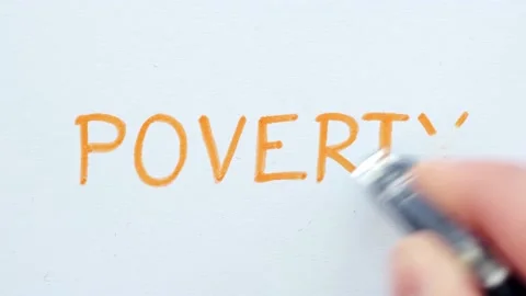 Erasing handwritten word Poverty. Stock Footage 132302824