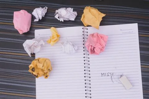 Erasing Mistake on notepad. Learning, wrong, blooper, regret sayings backgrou 스톡 사진