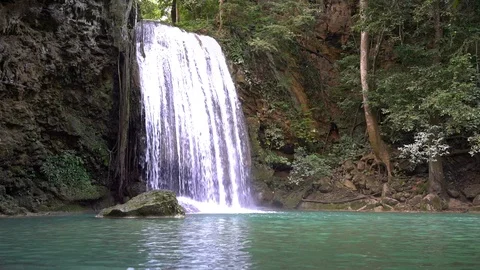 Erawan water fall (Third floor), tropical rainforest at Srinakarin Dam, Stock Footage 100827431