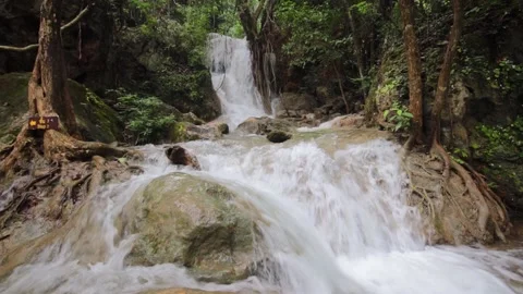 Erawan Waterfall in Deep forest at Kanchanaburi, Thailand Stock Footage 163783333
