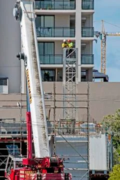 Erecting a Tower Crane. Stock Photos