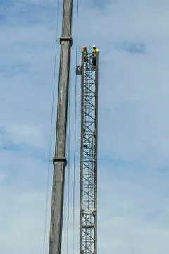 Erecting a Tower Crane. Stock Photos