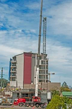 Erecting a Tower Crane. Stock Photos