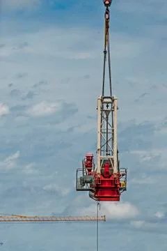 Erecting a Tower Crane. Stock Photos