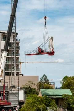 Erecting a Tower Crane. Stock Photos